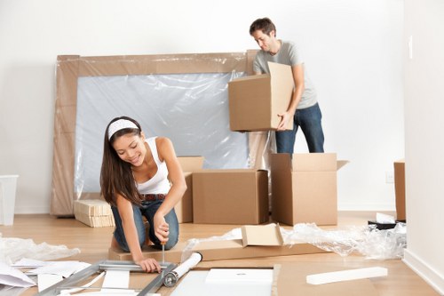 Employee using PPE while handling stored items in a secure facility