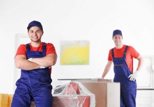 Professional house removals in Stjamess with moving boxes and a removal van