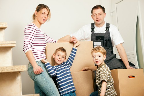 Removal team protecting furniture during a flat move in Stjamess
