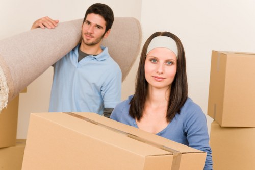 Packed moving boxes and furniture ready for local relocation in Stjamess